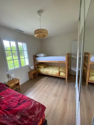 Un ou plusieurs lits dans un hébergement de l'établissement Les Nids de Galleben - La Villa Biscarrosse