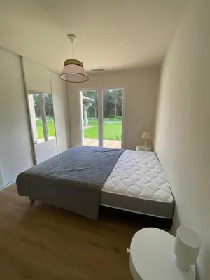 Un ou plusieurs lits dans un hébergement de l'établissement Les Nids de Galleben - La Villa Mimizan