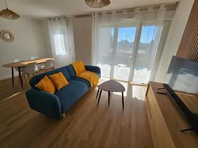 Télévision ou salle de divertissement dans l'établissement Appartement 2 chambres