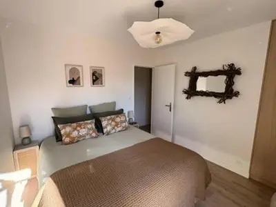 Un ou plusieurs lits dans un hébergement de l'établissement Villa rénovée sur Bassin d'Arcachon
