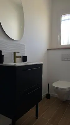 Salle de bains dans l'établissement Mageste 1