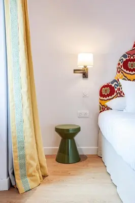 Un ou plusieurs lits dans un hébergement de l'établissement Hotel du Balcon