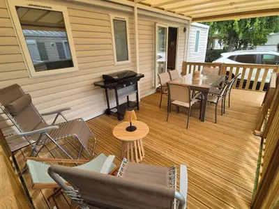 Coin salon dans l'établissement MOBIL HOME BISCAROSSE LAC - Loc du Samedi au Samedi uniquement