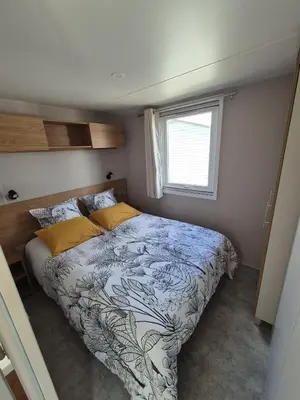 Un ou plusieurs lits dans un hébergement de l'établissement MOBIL HOME BISCAROSSE LAC - Loc du Samedi au Samedi uniquement