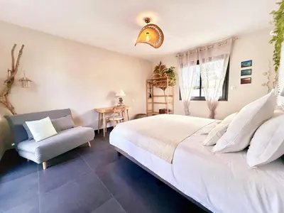 Coin salon dans l'établissement Villa l'Escapade Landaise