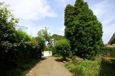 Jardin de l'établissement Spacieuse maison familiale entre pins et océan jusqu'à 10 personnes