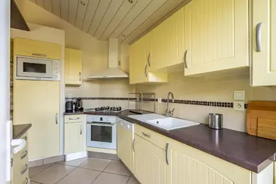 Cuisine ou kitchenette dans l'établissement Ma villa chez Archie, pour des vacances bucoliques