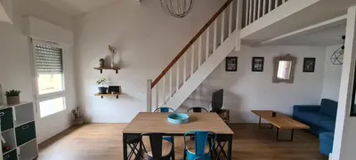 Coin salon dans l'établissement Duplex au cœur du bourg à 10 minutes de la plage