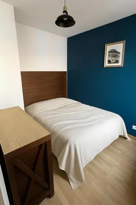 Un ou plusieurs lits dans un hébergement de l'établissement Appart spacieux, lumineux & calme Environnement nature, piscine