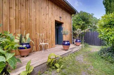 Jardin de l'établissement La maison du port – Maison avec piscine à La Teste