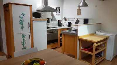 Cuisine ou kitchenette dans l'établissement L'escapade Landaise, Confort, Plage et Soleil