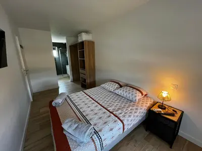 Un ou plusieurs lits dans un hébergement de l'établissement Villa Climatisée 8 Pers, 4 chambres, 3 Sdb