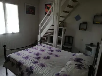 Un ou plusieurs lits dans un hébergement de l'établissement Maison familiale au calme avec piscine en bordure de forêt