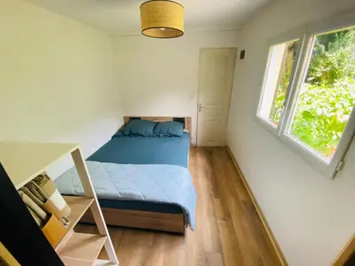 Un ou plusieurs lits dans un hébergement de l'établissement Appartement Saint Roch