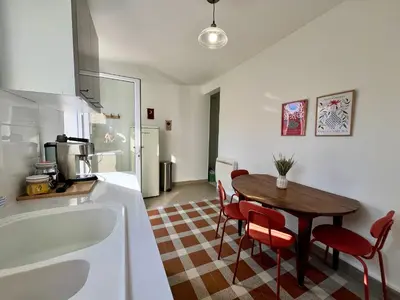 Cuisine ou kitchenette dans l'établissement Bel appartement à Capbreton