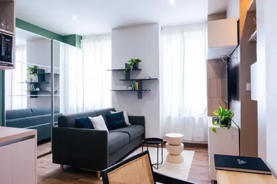 Coin salon dans l'établissement Charmant studio lumineux au coeur du centre ville