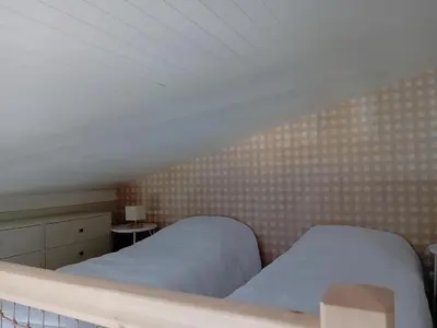 Un ou plusieurs lits dans un hébergement de l'établissement Seignosse : Appartement rénové à pied des plages avec climatisation - FR-1-239-1126