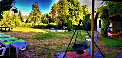 Jardin de l'établissement MAISON AVEC MAGNIFIQUE JARDIN LANDES Lit et mixe