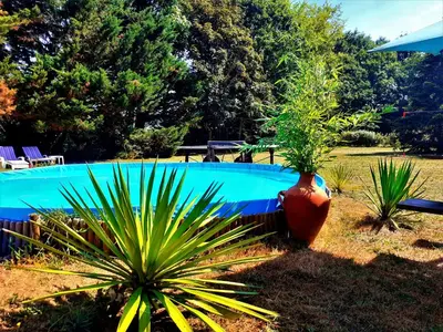 Jardin de l'établissement MAISON AVEC MAGNIFIQUE JARDIN LANDES Lit et mixe