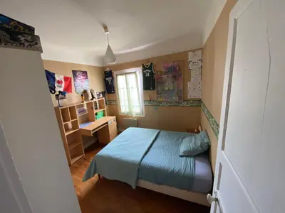 Un ou plusieurs lits dans un hébergement de l'établissement Appartement entre terre et océan
