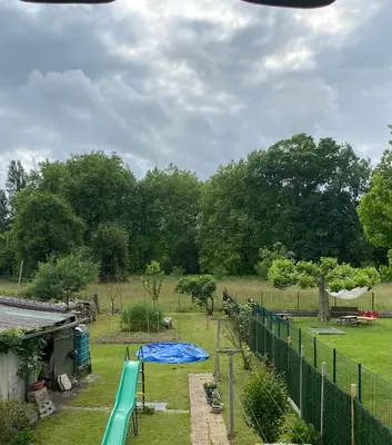 Jardin de l'établissement Appartement entre terre et océan