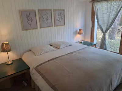 Un ou plusieurs lits dans un hébergement de l'établissement Savannah - La maison des pins