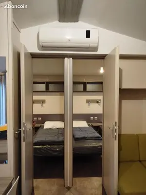 Un ou plusieurs lits dans un hébergement de l'établissement mobil-home 6 couchage sur la côte landaise