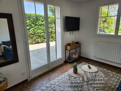 Télévision ou salle de divertissement dans l'établissement Appart à 100 m Arcachon Golf