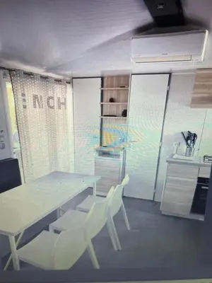 Cuisine ou kitchenette dans l'établissement Au Paradis
