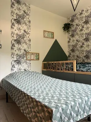 Un ou plusieurs lits dans un hébergement de l'établissement La Villa Détente