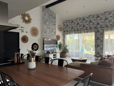 Coin salon dans l'établissement La Villa Détente