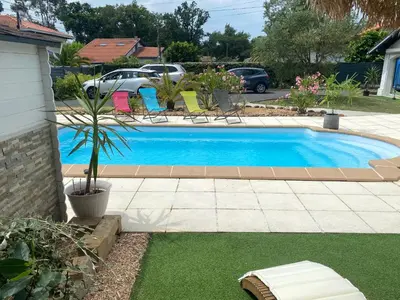 Piscine de l'établissement Maisonnette climatisée avec piscine et plage à 6mn ou située à proximité