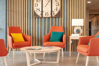 Coin salon dans l'établissement Quality Aparthotel Mont-de-Marsan