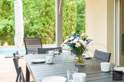 Jardin de l'établissement Villa familiale avec piscine chauffée 8 pers Biscarrosse Golf