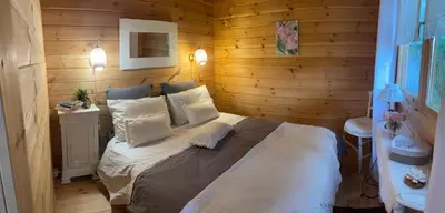 Un ou plusieurs lits dans un hébergement de l'établissement Chalet du bonheur
