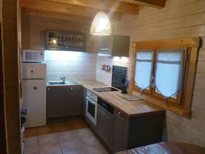 Cuisine ou kitchenette dans l'établissement la teste de buch chalet 143 ds domaine loisirs