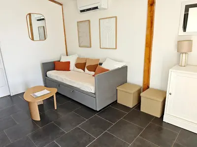 Coin salon dans l'établissement Gîte Le Grand Landais - La Forge De Clermont