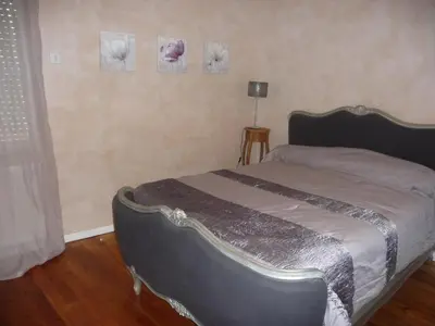 Un ou plusieurs lits dans un hébergement de l'établissement Maison de ville tout confort