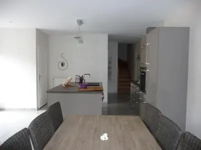 Coin salon dans l'établissement Maison de ville tout confort