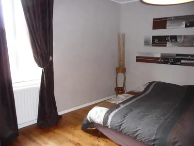Coin salon dans l'établissement Maison de ville tout confort