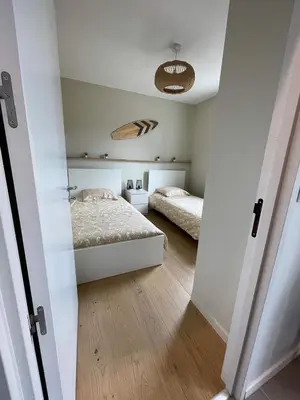 Un ou plusieurs lits dans un hébergement de l'établissement Villa Cinta, des vacances en bord d'océan