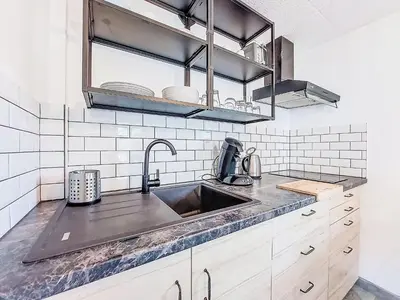 Cuisine ou kitchenette dans l'établissement Holiday Home L'imprévu by Interhome