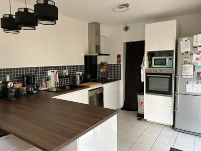 Cuisine ou kitchenette dans l'établissement Maison au calme avec jardin