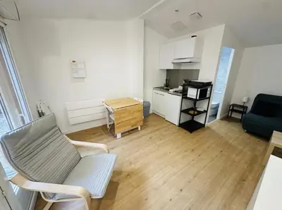 Cuisine ou kitchenette dans l'établissement Neuf lumineux et agréable en rdc avec terrasse - 33