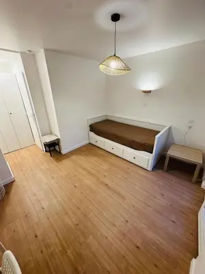 Un ou plusieurs lits dans un hébergement de l'établissement Appartement tout neuf avec patio - 31