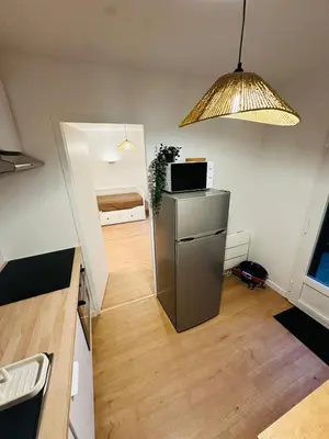 Cuisine ou kitchenette dans l'établissement Appartement tout neuf avec patio - 31