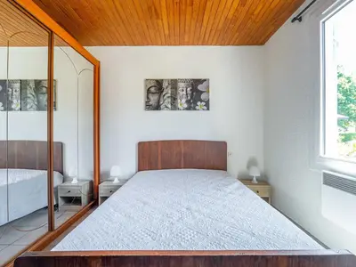 Un ou plusieurs lits dans un hébergement de l'établissement Maison à Mimizan Plage Sud avec jardin pour 4 personnes - Ménage inclus - FR-1-50-182