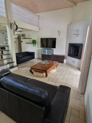 Coin salon dans l'établissement Beautiful Villa Landaise , pool, garden, 4 bedrooms