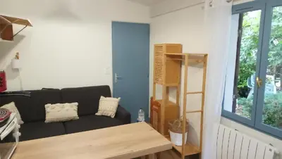 Coin salon dans l'établissement Maison RELAX au BASSIN