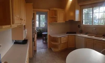 Cuisine ou kitchenette dans l'établissement Au petit Ruisseau, maison à Capbreton